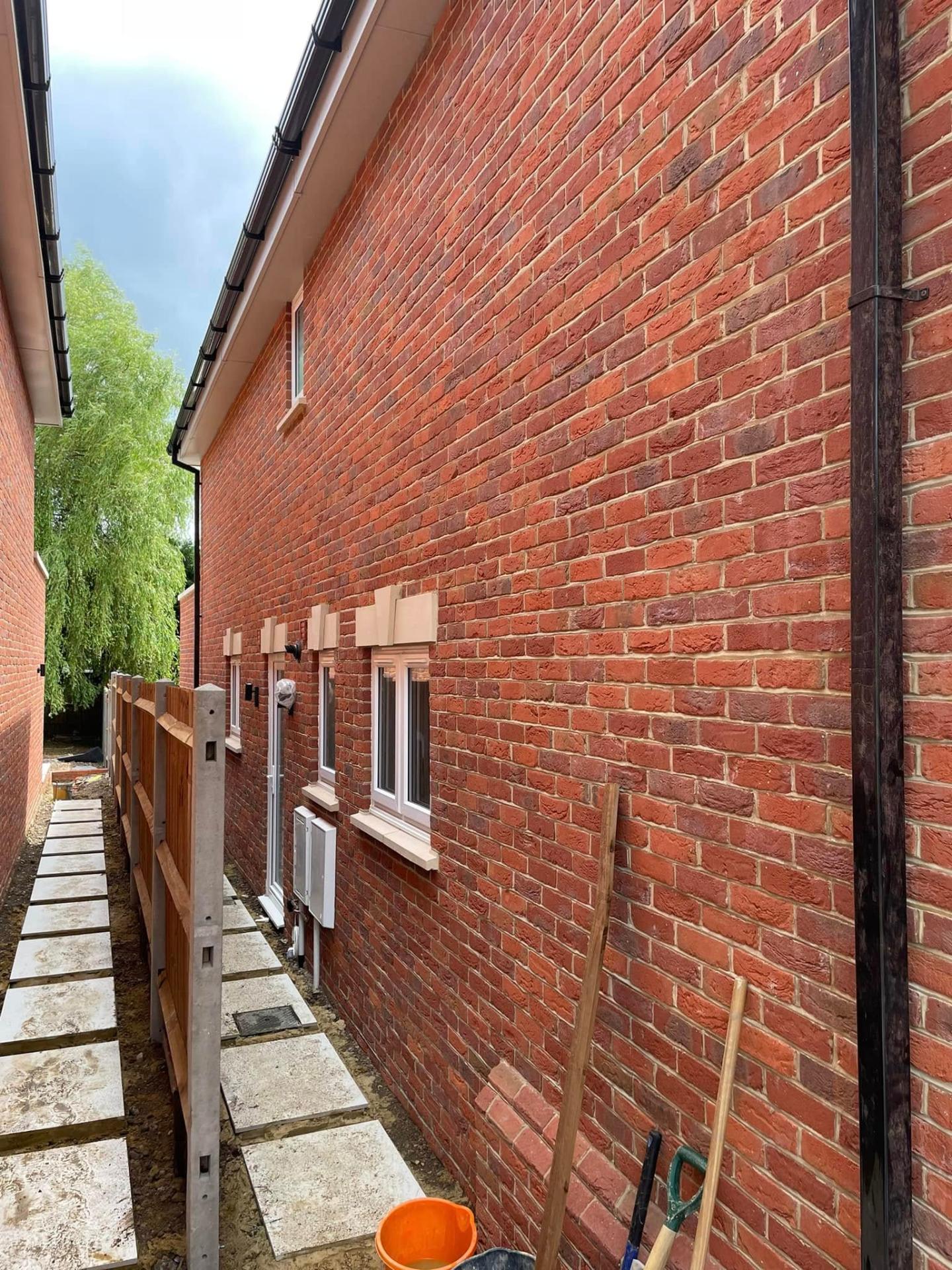 new build house brickwork and fencing — Philbert Construction brickwork project in Reading